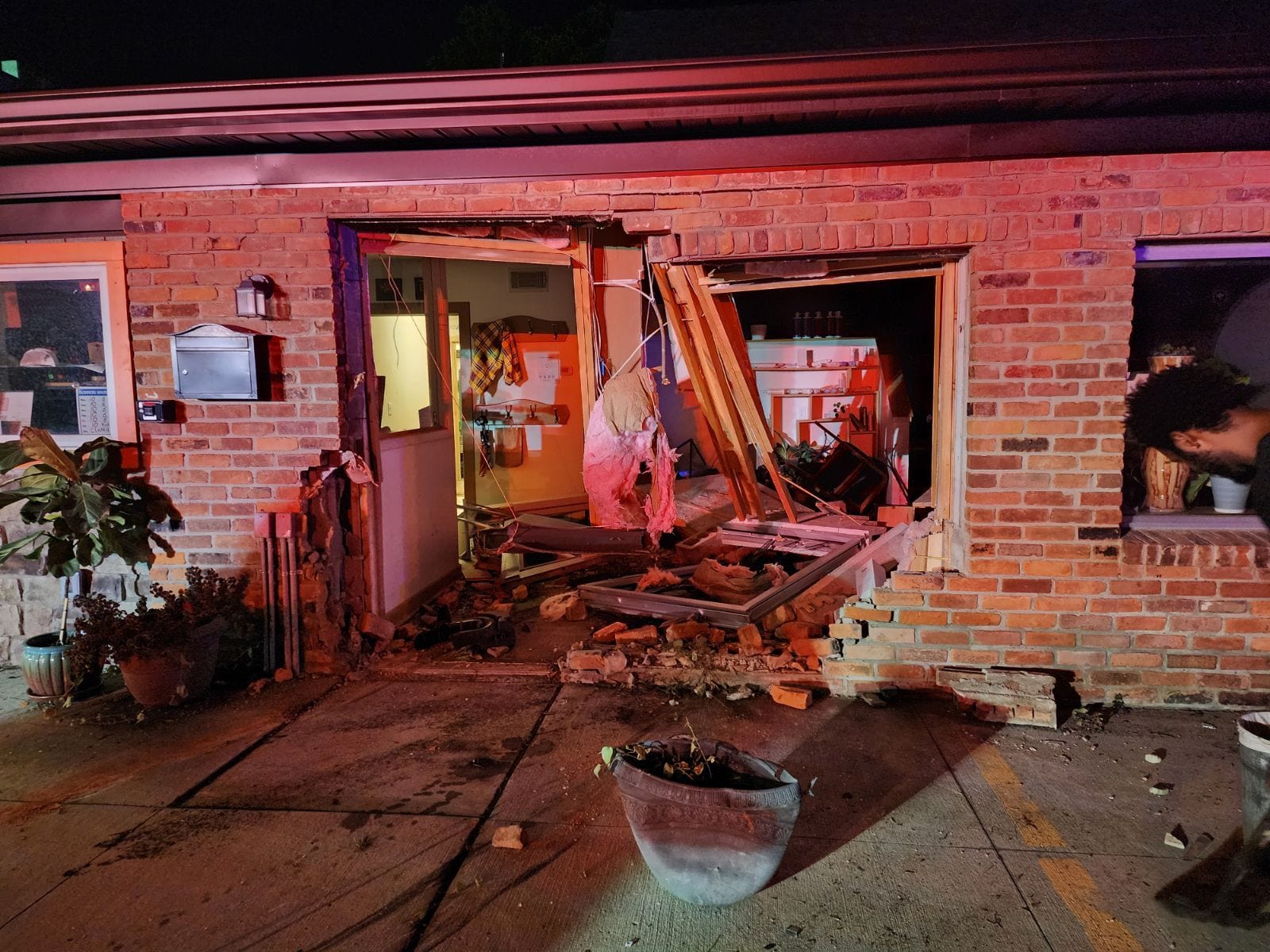 The storefront of Carrot Stick Sports after a car drove through the building.