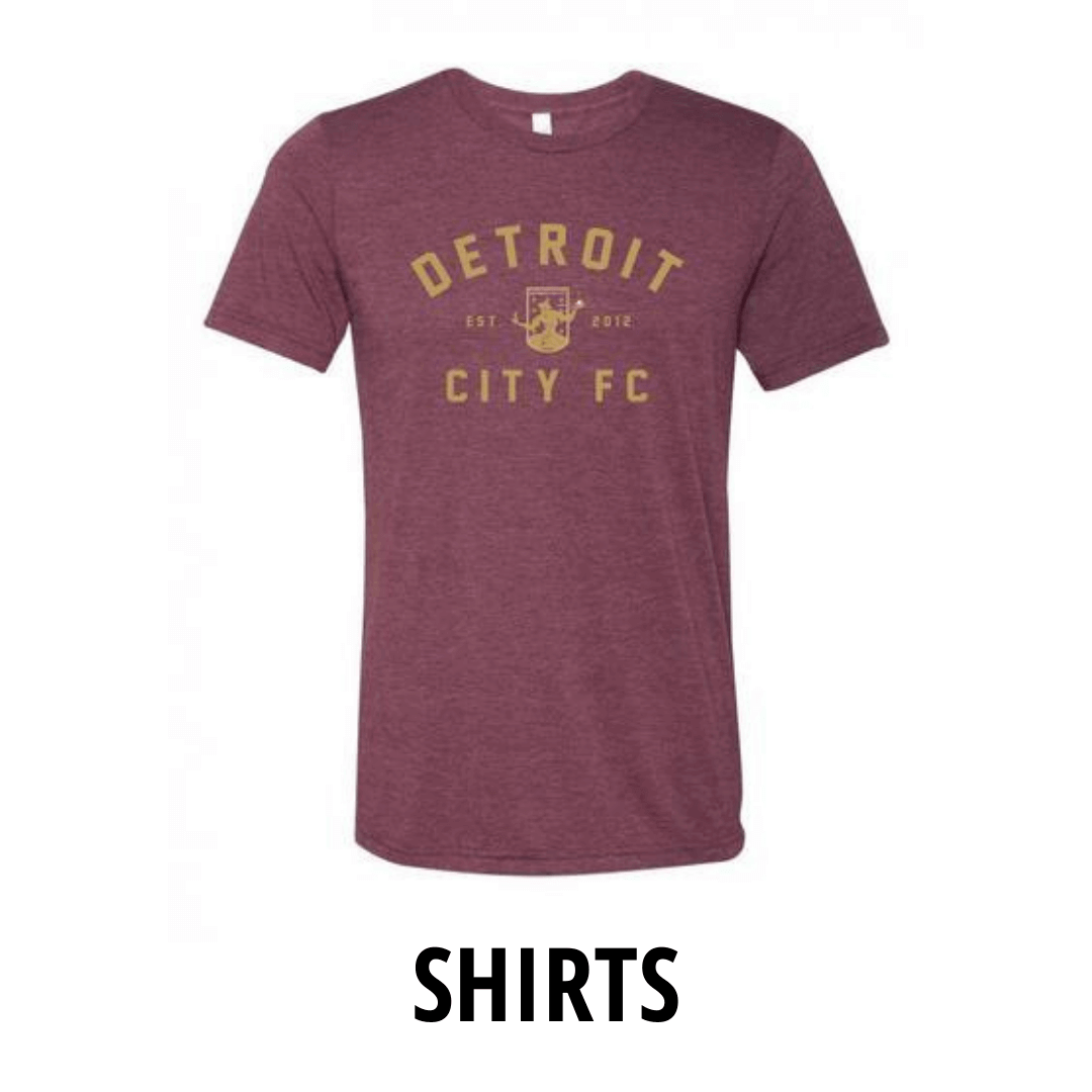 Maroon Detroit City Football Club tee shirt with the Spirit of Detroit on it.